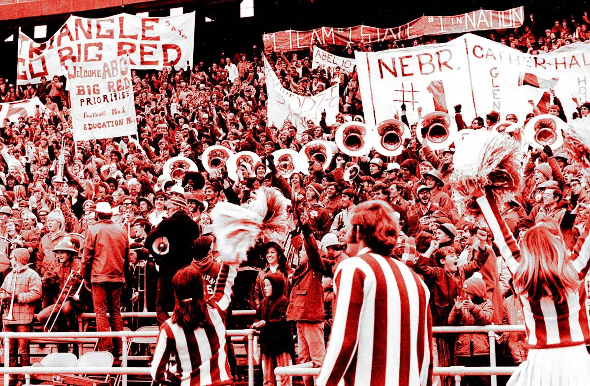 Old photo of fans and band in the stands